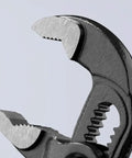 Close-up of Cobra Water Pump Pliers, 5 Inch, Red, Adjustable Pliers with self-locking teeth and 13 positions for pipes and nuts.