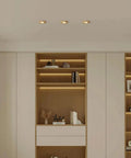 XYIANG 3.9 Inch Farmhouse Wood Grain Recessed Lighting Housing Trim Kits 7W Led Recessed Lighting installed in modern cabinetry.