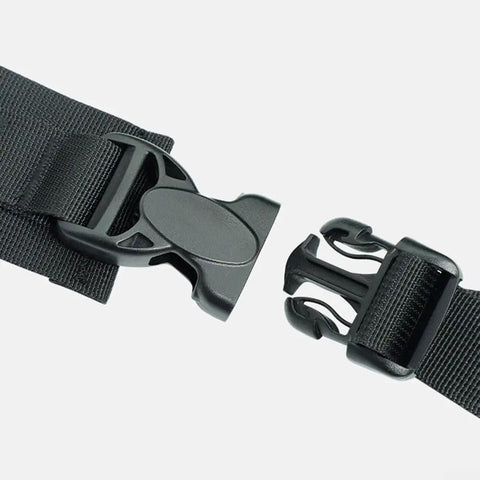 Close-up of buckle on 45L Rope Bag For Climbing And Mountaineering, Lightweight Black Gear Backpack with Drawstring Closure.