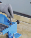 Using the heavy duty sheet metal brake for precise bending operations.