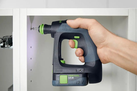 Person using Cordless CXS 2 Drill Kit With 3 Tools In One, FastFix For Centrotec Chuck, Keyless Chuck, And Optional Right Angle Attachment