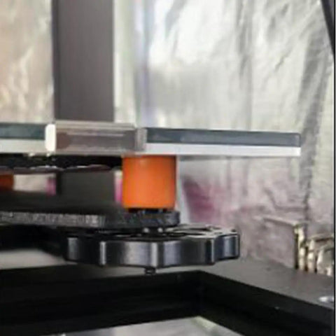 Close-up of a silicone bed mount from the Silicone Bed Mounts And Spacers Kit For 3D Printers Heat Bed Leveling Replacement Parts.