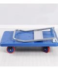 Heavy Duty Foldable Rolling Dolly, No Sweat Hauling With Silent Wheels, Space Saving Steel Frame Pushcart For Quick Home Moves And Warehouse Jobs, Solid Blue Build, side view, folded flat.