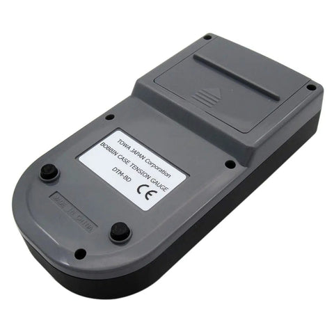 Digital Bobbin Case Tension Gauge By Towa With L And M Style Inserts Ready To Compare With TM-1 L Style And TM-3 M Style Includes TM-501 Small Bobbin Insert And TM-502 Jumbo Insert Compact Pro Grade Tension Tester For Sewing Machines, gray plastic