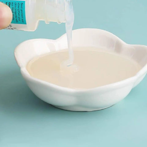 Glossy Clear Clay Sealant For Air And Polymer Clay Water Based Varnish Sealer 4.05oz 120ml being poured into a bowl