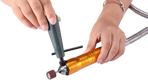 Hands adjusting 1200W Flex Shaft Grinder Rotary Tool With Overhead Hanger, Forward And Reverse Rotation, Foot Pedal Control