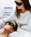 Heavy Duty IPL Safety Glasses With Broad Spectrum Protection For Hair Removal And Beauty Therapy Lock In Zero Stress Eye Coverage For 200 To 2000 Nm UV Rays and Blue Light Filters in use during a treatment.