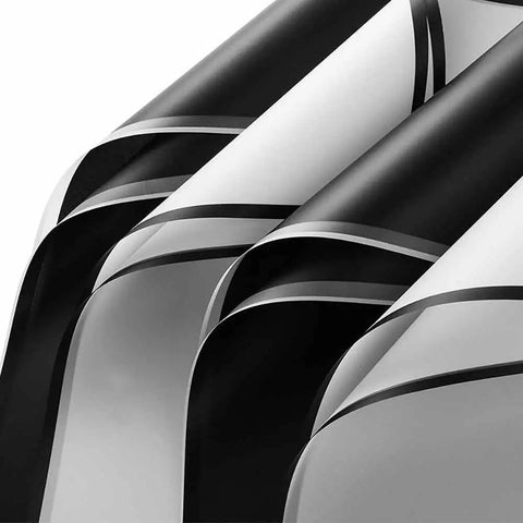 Close-up of waterproof black and white floral wrapping paper sheets 22.83 inch square, 20 sheets for bouquets and gift packaging.