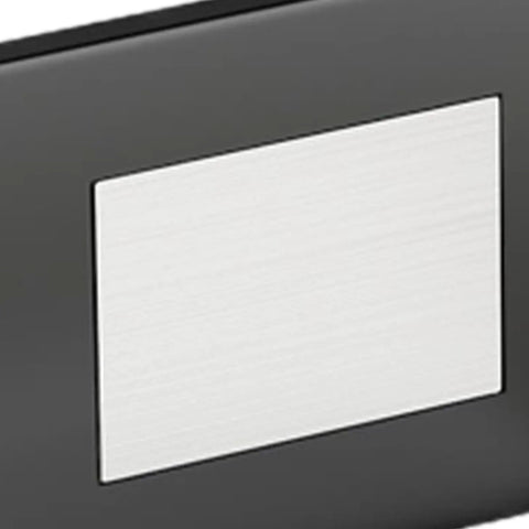 Close-up of a self-adhesive magnetic pad from the Six Piece Self Adhesive Magnetic Drawer And Cabinet Locks Kit for easy install.