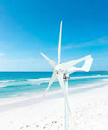 Powerful 1200W Wind Generator With 5 Blade High Efficiency Turbine near a beach, weather resistant for home marine use