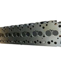 Premium Quality Top Shelf 6D34 Cylinder Head With Full Gasket And Valve Kit For Mitsubishi MG230 Motor Grader side view showing valve seats and ports.