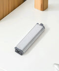 Push to Open Cabinet Latch Set Six Piece No Handle Needed Self Eject Design With Steel Shell Soft Close Hinges on a countertop