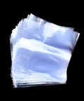 4 X 4 Inch Heat Shrink Bags 300 Pack Slick Glossy Polyolefin Film in a stack, perfect for wrapping soap bars and crafts.