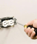Using Six Piece Screwdriver Set With Cushion Grip Comfort, Precision Machined Flathead And Phillips Bits on electrical outlet, Made In USA.