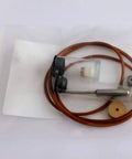 Front view of pneumatic valve repair kit in clear bag; orange hose coiled with metal probe.