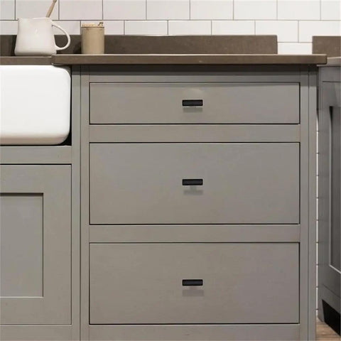 Hella Sleek Matte Black T Pull Cabinet Knobs 1.5 Inch Horizontal Handles For Kitchen Cabinets on gray cabinetry with drawers.