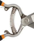 Close-up of spring mechanism on Pro Grade Forged Grass Shears For Precise Edging And Thick Sod Spring Action Opens Blades After Each Cut