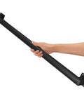 Hand holding a black Modern Wrought Iron Stair Handrail And Adjustable Metal Railing Featuring Heavy Duty Square Pipe Bannister.