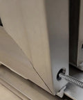 Close-up of Top Shelf Stainless Steel Screws For Framed Shower Door Panel Assembly, Pack Of Four, One Point Three Eight Inches installed into aluminum frame.