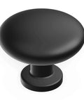 Round Matte Black Kitchen Cabinet Knobs 10 Pack Durable Drawer And Dresser Knobs For Cabinets And Bathroom Drawers One And One Eighth Inch Easy Install Slick Modern Hardware By Hickory Hardware close-up view