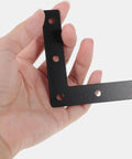 Hand holding Built To Last Heavy Duty Dark Steel L Shaped Corner Bracket With Pre Drilled Holes
