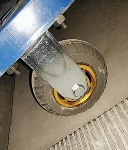 Heavy Duty Rubber Swivel Casters Set Of Four Rolls Like Butter Smooth Rolling Wheels For Furniture And Moving Carts Real Workhorse Build Sealed Ball Bearings close-up of a caster wheel on a concrete surface.