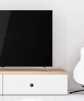 Front view of entertainment center with white cabinet featuring 5cm walnut wood cone cabinet knobs drawer pull handles for wardrobe and kitchen cabinets dope durable furniture hardware upgrade your dresser and closet with easy installation.