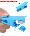 Portable MTB Hydraulic Brake Line Cutter For Bike Disc Brakes in use, cutting a white hydraulic hose with a blue ABS body
