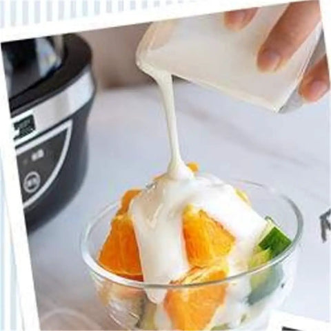 No Sweat Automatic Yogurt Maker With Four Leakproof Glass Jars pouring homemade yogurt over fruit salad.