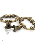Close-up of 6 Sets Distressed Antique Brass Vintage Cabinet Pulls With Drop Ring Handles For Dresser Drawers And Cupboards 1.9 In By 1.8 In Zinc Alloy