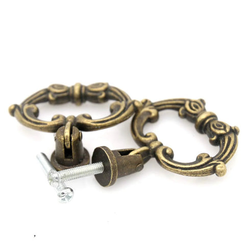 Close-up of 6 Sets Distressed Antique Brass Vintage Cabinet Pulls With Drop Ring Handles For Dresser Drawers And Cupboards 1.9 In By 1.8 In Zinc Alloy
