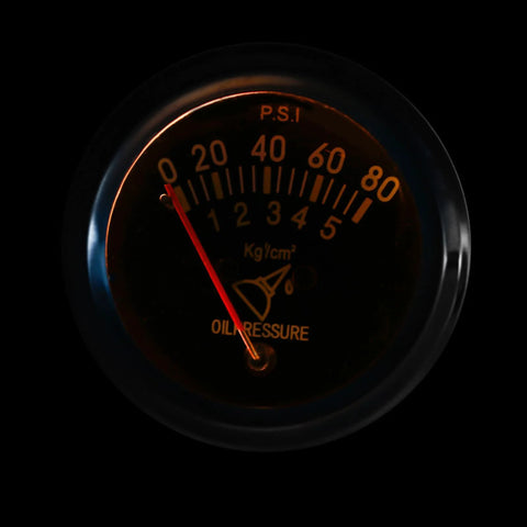 Front view of a 2-inch automotive oil pressure gauge, black face with orange numerals and red needle, 0–80 PSI.