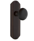 Deco Plate Passage Door Knob Set With Solid Brass Plates And Lead Crystal Knobs, Black Porcelain Finish In Timeless Bronze shown front view