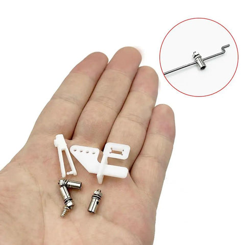 RC Model Pushrod Set Ten Pieces 1.2 X 200mm Push Rods With 1.3mm Adjustable Connectors And Micro Control Horns in hand