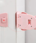 Close-up of pink bear-shaped cabinet lock, part of a Three Pack Kid Safe Safety Cabinet Locks With Non Marking Adhesive.