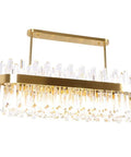 Slick Fresh Oval Glow Dimmable LED Pendant Light Adjustable Hanging Ceiling Fixture For Dining Room And Kitchen Top Shelf Gold Steel Chandelier with crystal accents.