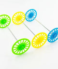 Vintage Toy Car Wheels Set With 2mm Round Shaft Axles For RC Cars Trucks And DIY Robots 30Pcs in green, yellow, and blue color.