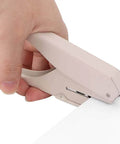 Hand using Mushroom Hole Puncher 6 Sheet A4 Capacity, mushroom-shaped paper puncher for office, school, and craft, 15 by 8.5 cm tool