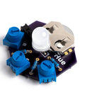 Learn To Solder Starter Kit For Beginners with RGB LED Practice Board, battery holder, and resistors on a compact circuit board.