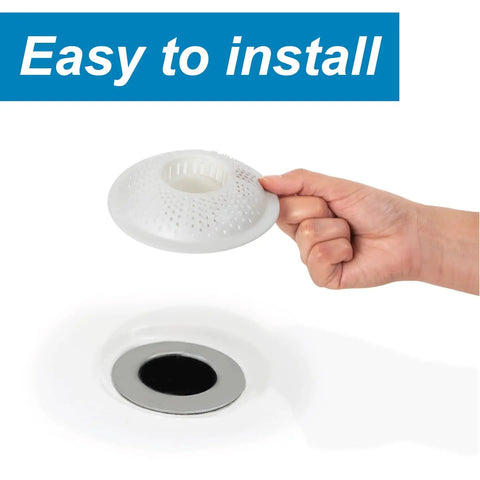 Hand holding a Drain Cover Hair Catcher For Shower And Bathtub 3 Pack That Keeps Hair Out And Prevents Clogs While Letting Water Flow Freely