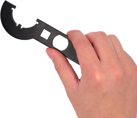 Hand holding Grunt Worthy Three Eighths Inch Drive Wrench Combo for removing and installing Castle DIN 1804 nuts using durable 45 steel