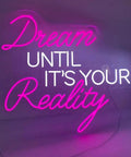 Customizable Neon LED Wall Light Sign For Wall Decor Mood Lighting For Kids Parties Bedroom Home Room Easter Christmas Gifts Lit Vibe Color Change 50cm with 'Dream Until It's Your Reality' text in pink and white neon.