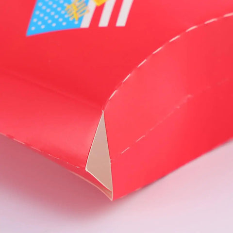 Close-up of a 100 Pack Disposable Red Paper Snack Boxes Portable Chips Boxes Safe Food Grade Paper Serving Trays detail.