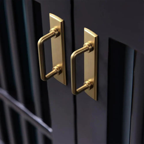 Close-up of Champagne Bronze Cabinet Pulls With Escutcheon Backplates, Sleek 3 Inch Hole Center Modern Kitchen Drawer Handles