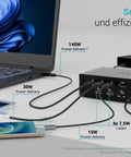 Game Changer Thunderbolt 5 Laptop Docking Station with Dual HDMI 2.0 Ports in use with a laptop and multiple devices.
