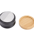 Dual Head Espresso Coffee Distributor And Adjustable Tamper With Bamboo Base showing metal tamper and bamboo base side by side.