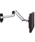 Premium Full Motion Aluminum Wall Mount Monitor Arm Featuring Smooth As Butter Mechanical Spring Adjustments That Handles Heavy Loads Without Breaking A Sweat For 17 To 27 Inch LCD LED Displays VESA 75X100 Silver, side view showing extension.