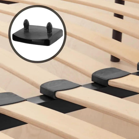 Close-up of 20 Piece Set Of Heavy Duty Plastic Replacement Bed Slat Caps 54X10Mm Durable Pp Retainer Clips on bed slats.