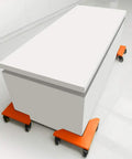Heavy Duty Furniture Dolly Set Of 4 With Wheels And Floor Safe Rubber Pads, 1,380 Lb Load Capacity under a white cabinet