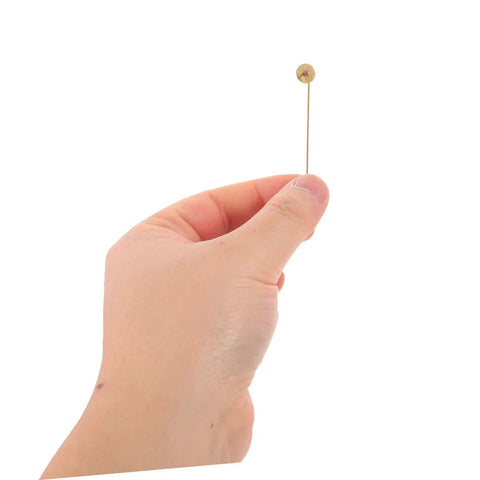 Bulk 50 Pack Copper Flat Round Tray Lapel Pins With Heavy Fabric Fastening And Raw Finish Metal Brooch Sticks For Industrial Crafts And Costume Accessories held in hand